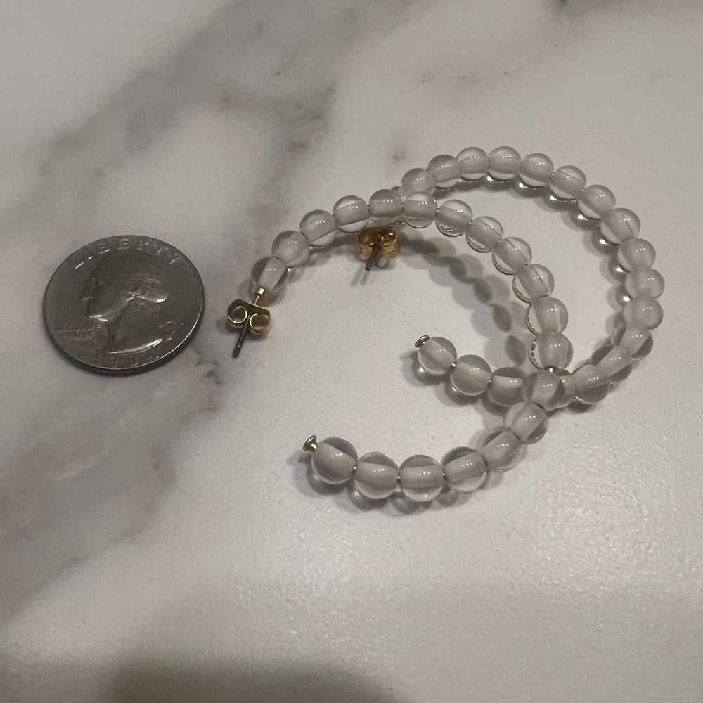 Anthropologie clear beaded hoop earrings.